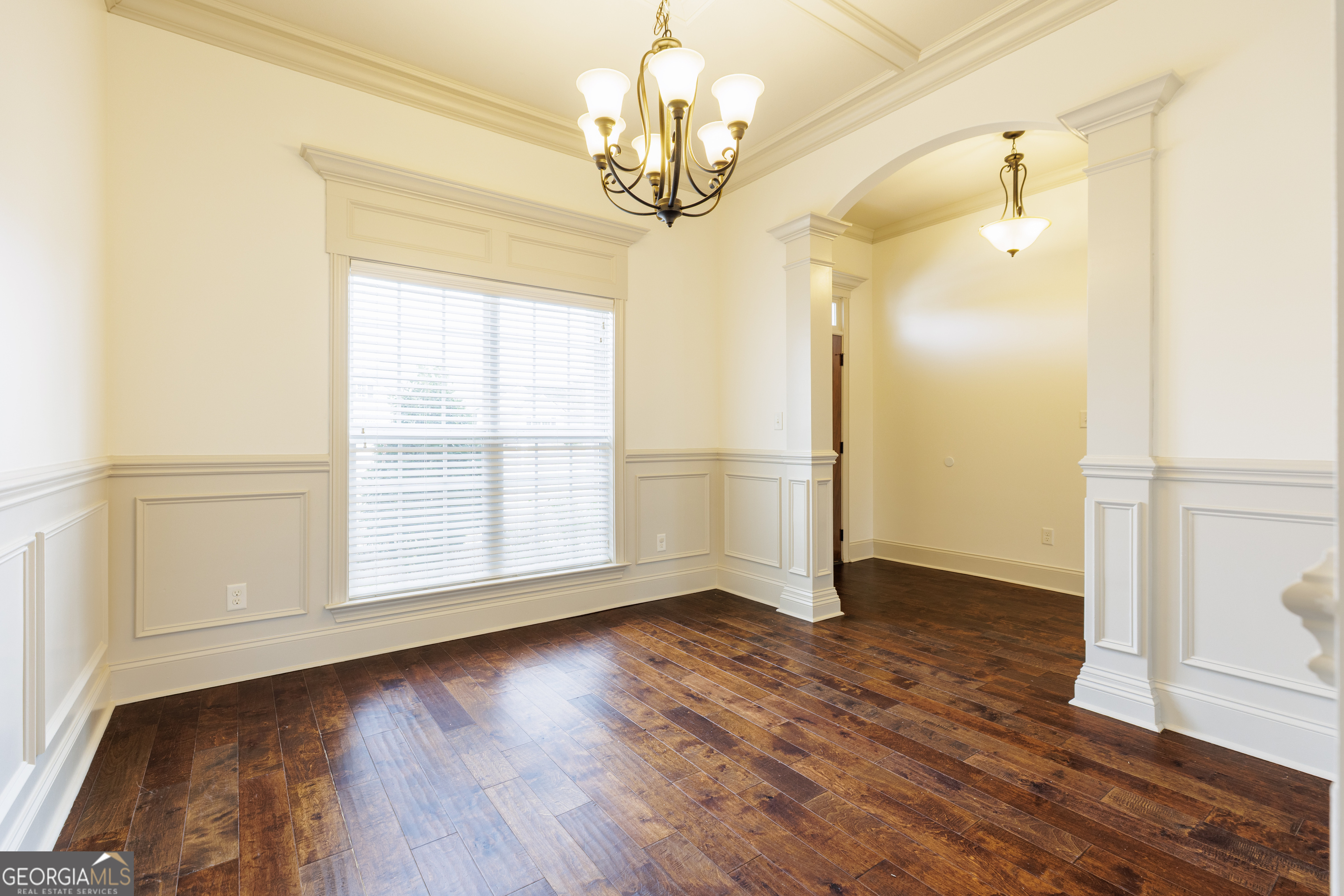 5109 Village Way Hahira, GA 31632 - Photo 18 of 42 a view of empty room with wooden floor and fan