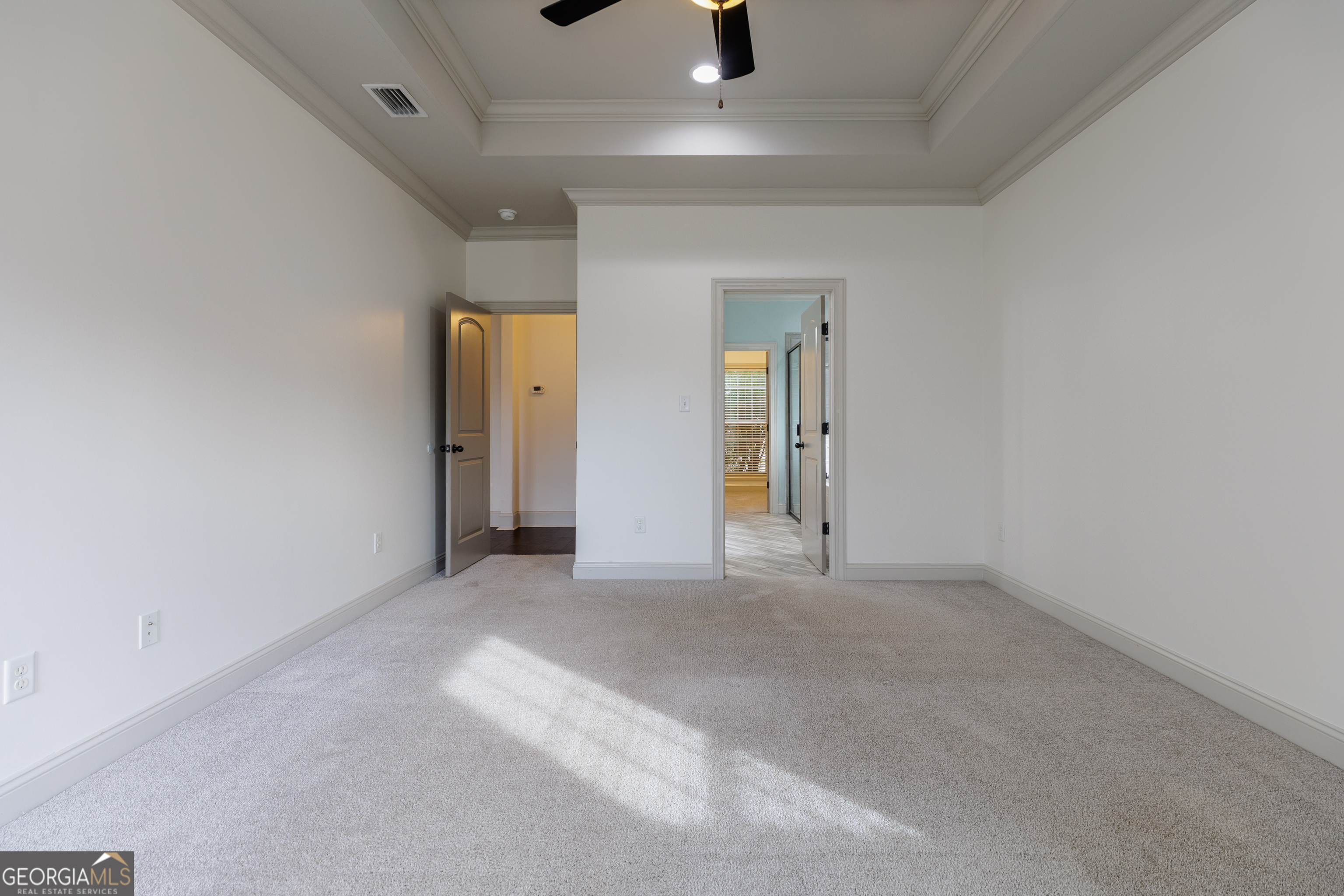 5109 Village Way Hahira, GA 31632 - Photo 20 of 42 an empty room with a empty space and windows