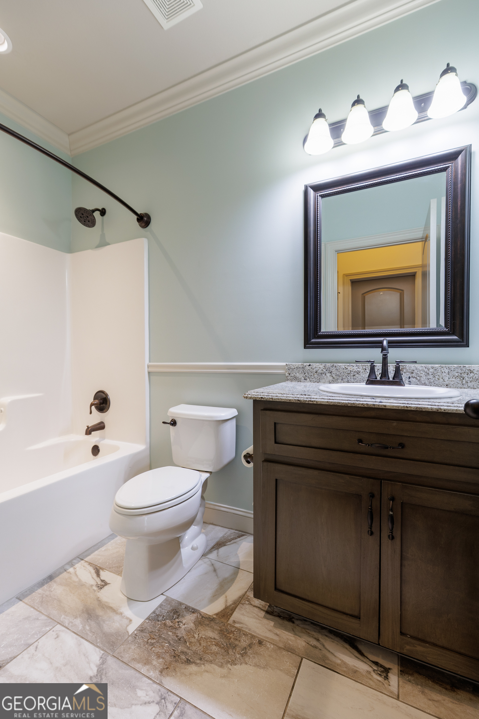 5109 Village Way Hahira, GA 31632 - Photo 28 of 42 a bathroom with a sink toilet and shower