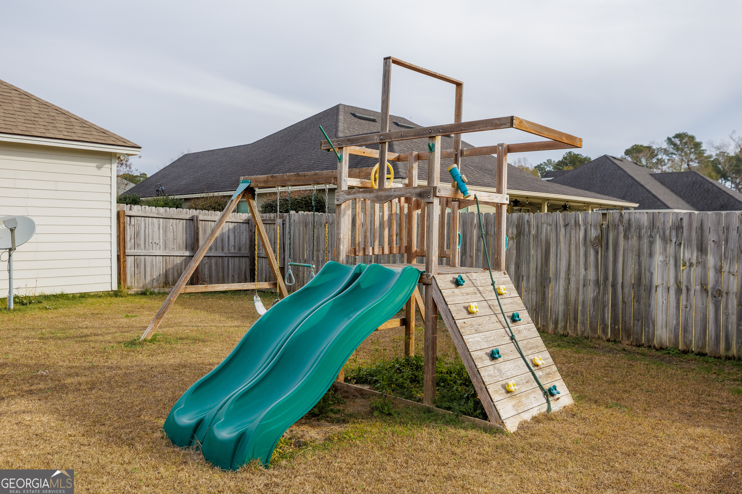 5109 Village Way Hahira, GA 31632 - Photo 40 of 42 a view of a house with a backyard