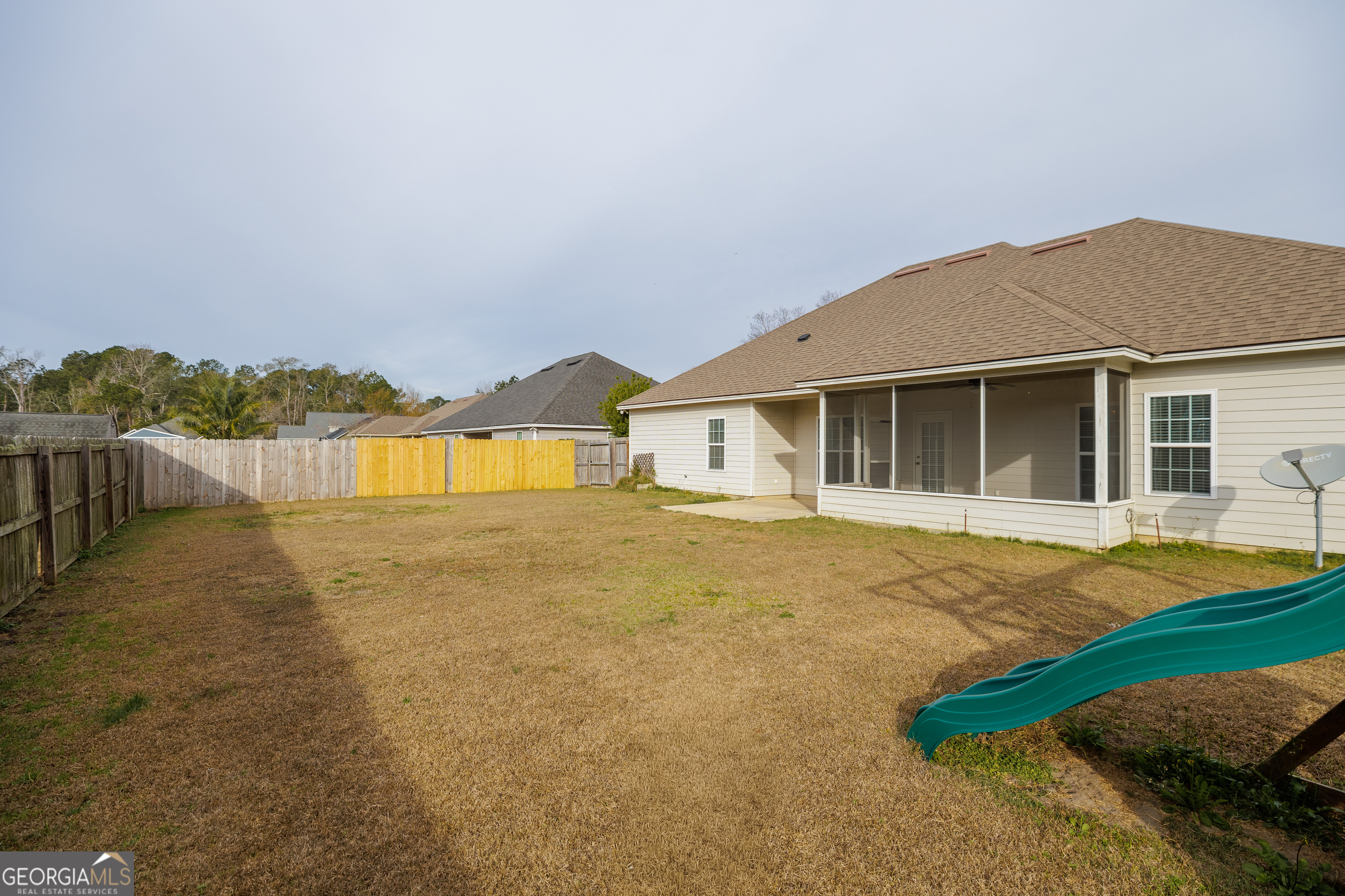 5109 Village Way Hahira, GA 31632 - Photo 41 of 42 a view of a house with a backyard and a tree