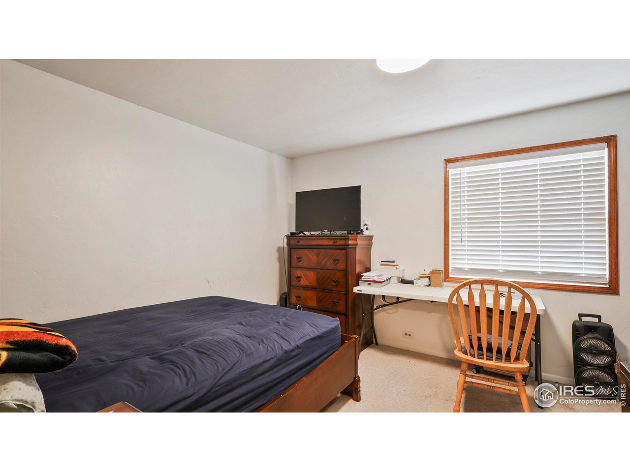 15985 Echo Road Fort Morgan, CO 80701 - Photo 12 of 22 a living room with furniture and a flat screen tv