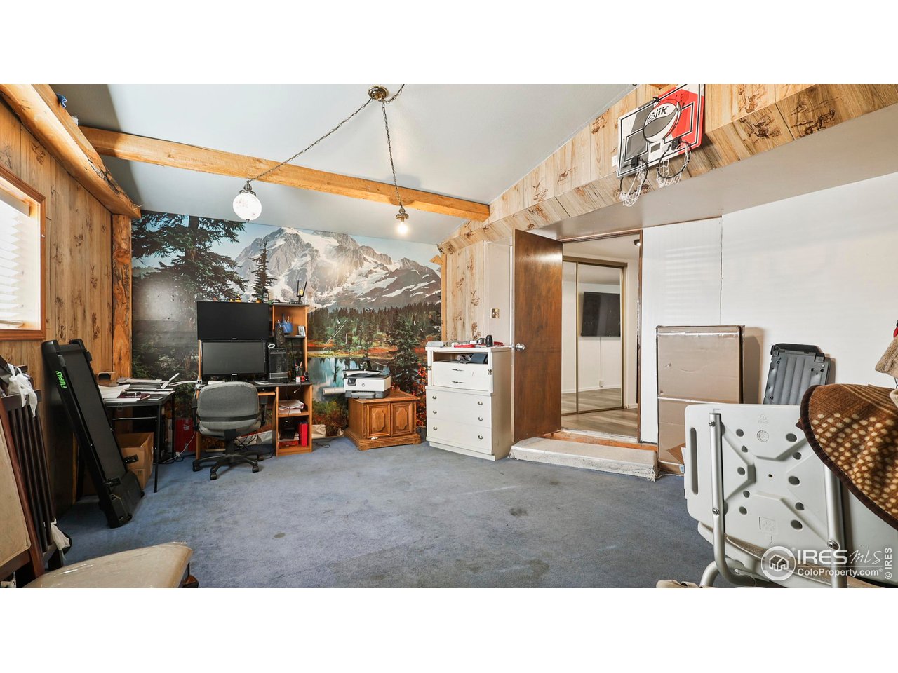 15985 Echo Road Fort Morgan, CO 80701 - Photo 18 of 22 a room with furniture and a flat screen tv