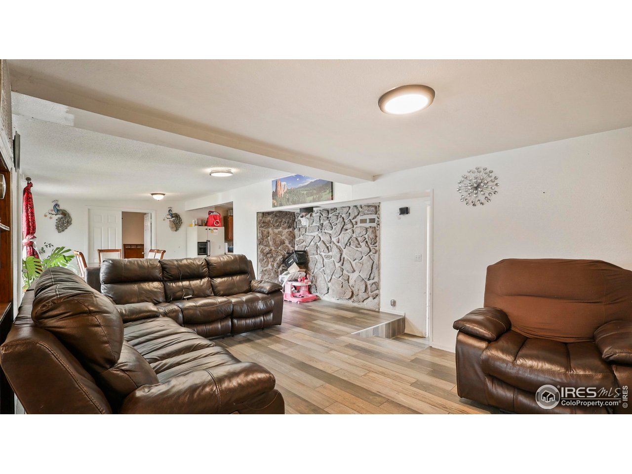 15985 Echo Road Fort Morgan, CO 80701 - Photo 2 of 22 a living room with furniture and a couch