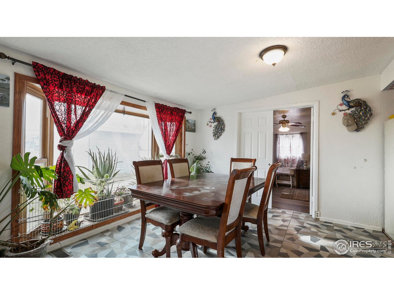 15985 Echo Road Fort Morgan, CO 80701 - Photo 4 of 22 a dining room view with a table and chairs