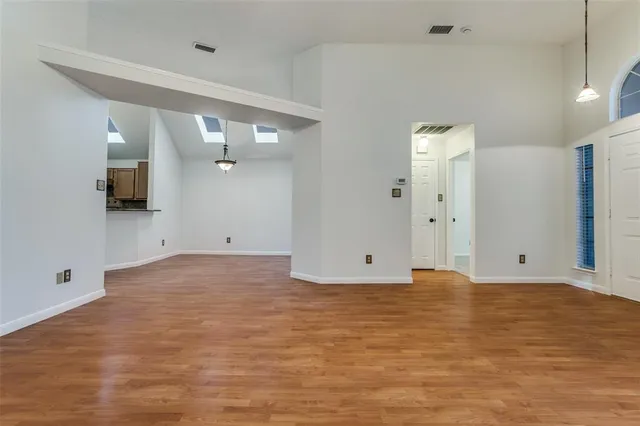 a view of a room with a flat screen tv