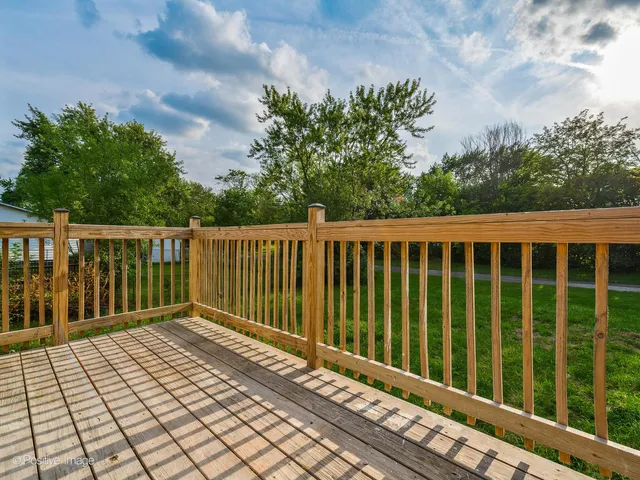 a view of a wooden fence