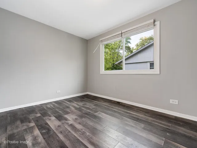 a view of a room that has a window in it