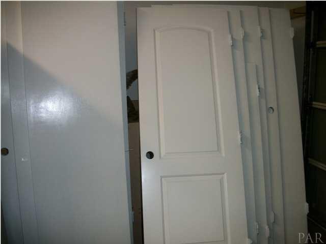 4773 Santa Rosa Drive Pace, FL 32571 - Photo 19 of 21 all doors have been painted.