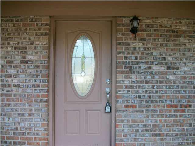 nice front door and brick.