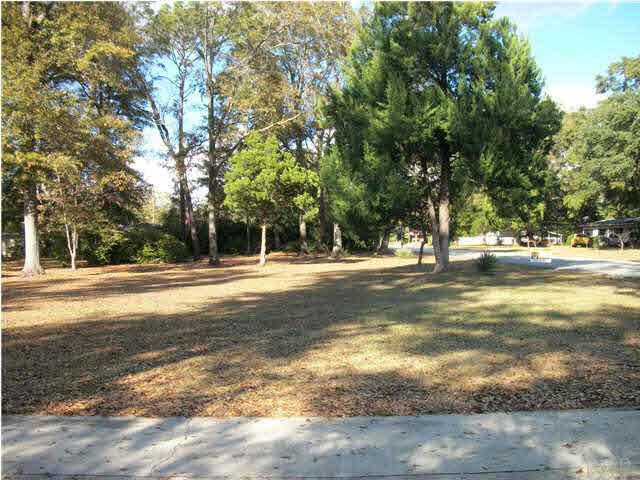 4773 Santa Rosa Drive Pace, FL 32571 - Photo 10 of 21 extra lot to north side of home. beautiful trees, needs a picnic table and hammock!