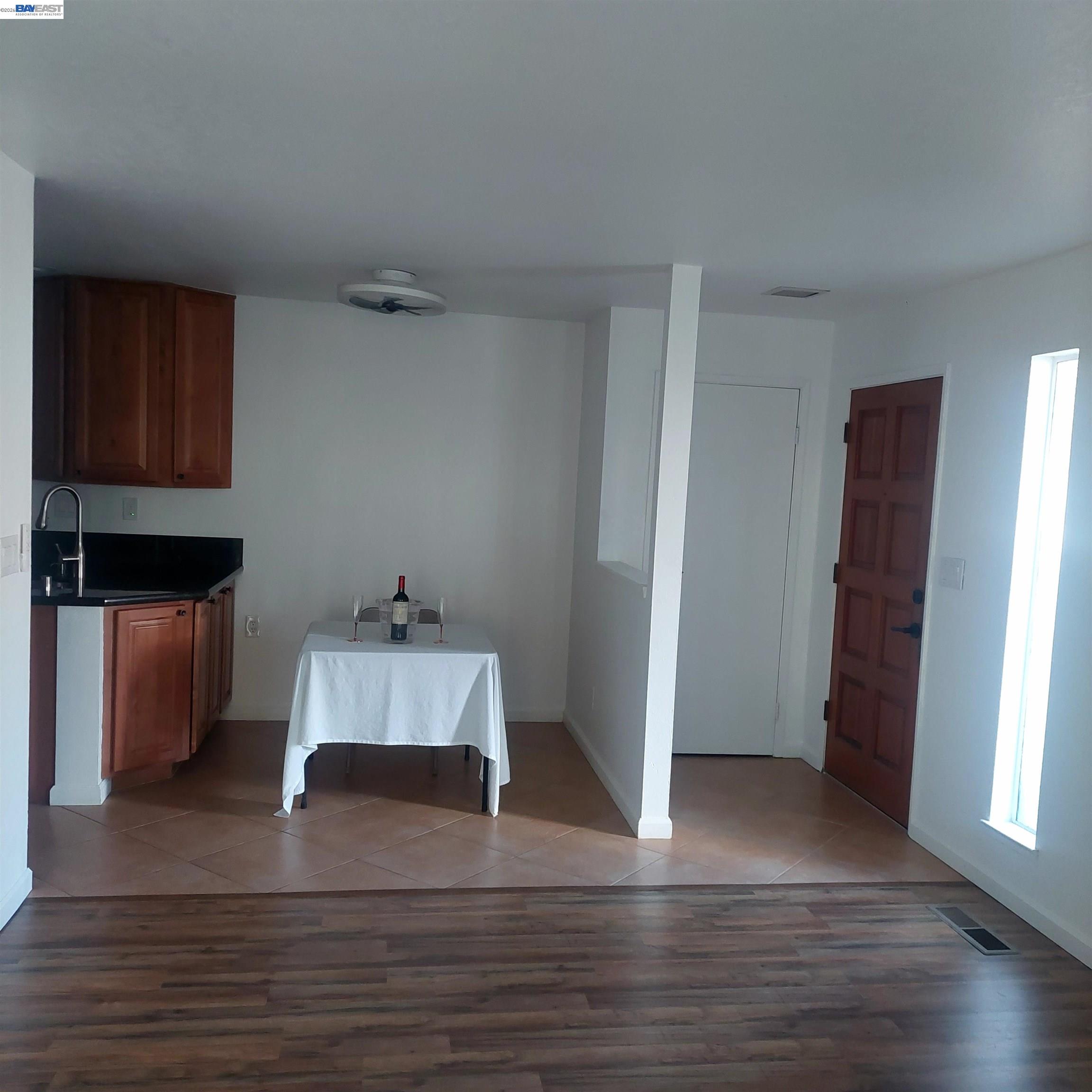 1544 Bailey Road, Unit 3 Concord, CA 94521 - Photo 3 of 10 an entryway with wooden floor and cabinet
