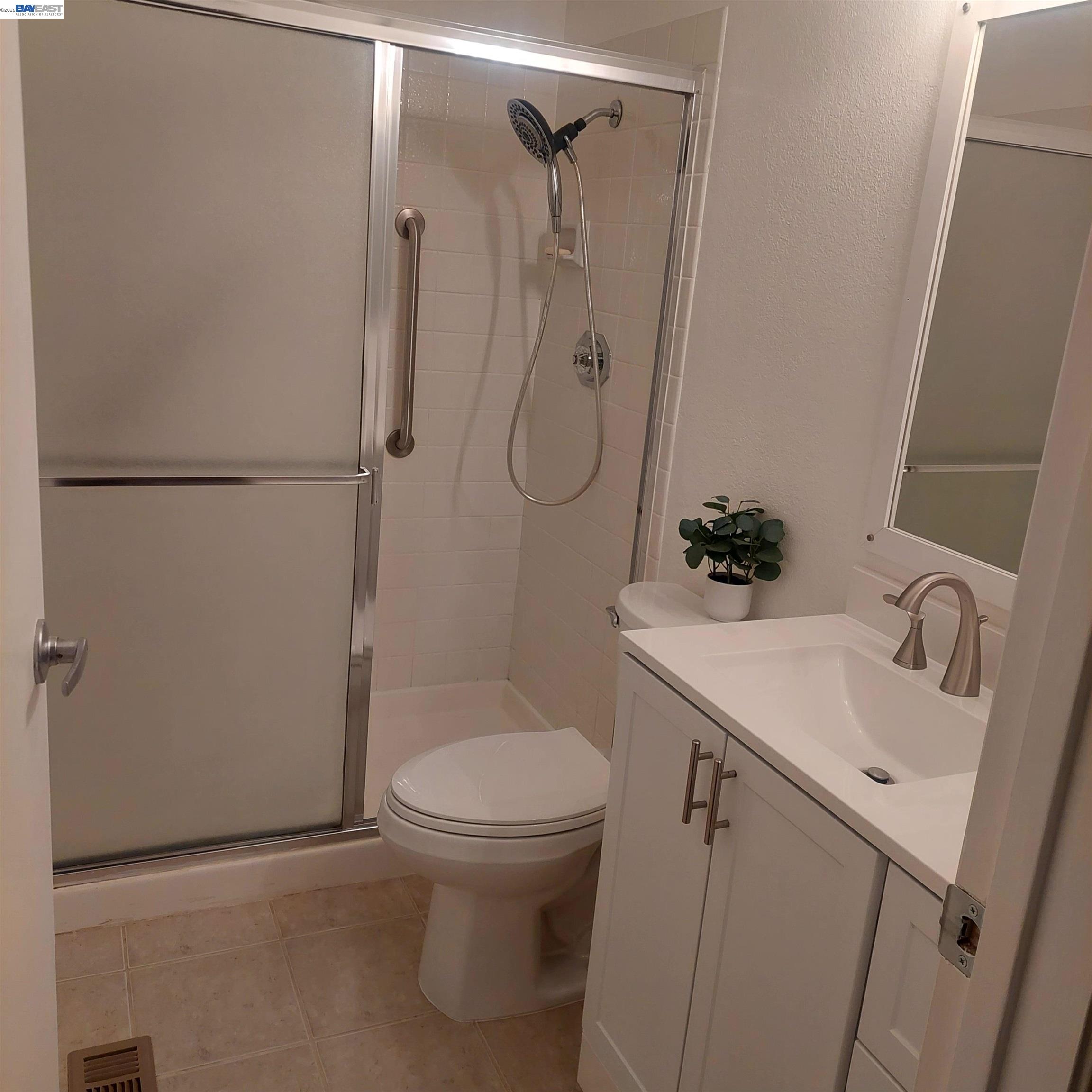 1544 Bailey Road, Unit 3 Concord, CA 94521 - Photo 5 of 10 a bathroom with a sink toilet and shower