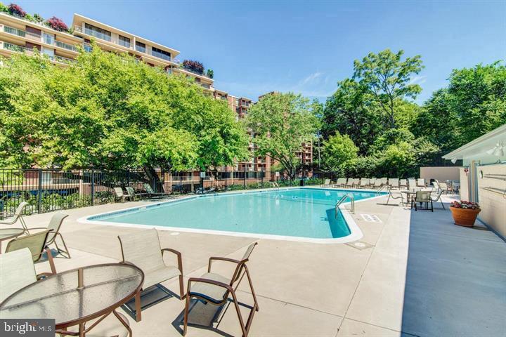1200 South Arlington Ridge Road, Unit 714 Arlington, VA 22202 - Photo 24 of 24 a view of a swimming pool with a patio