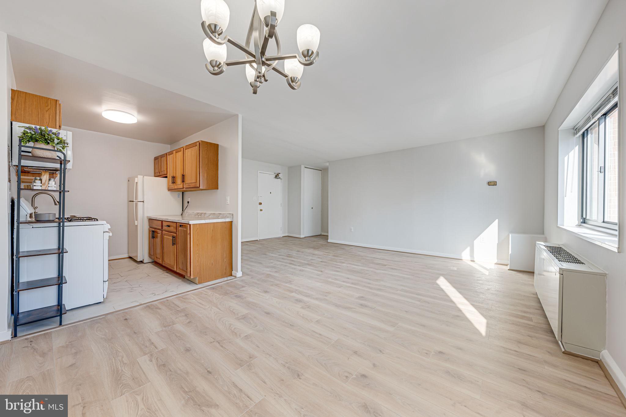 1200 South Arlington Ridge Road, Unit 714 Arlington, VA 22202 - Photo 7 of 24 a view of kitchen and microwave