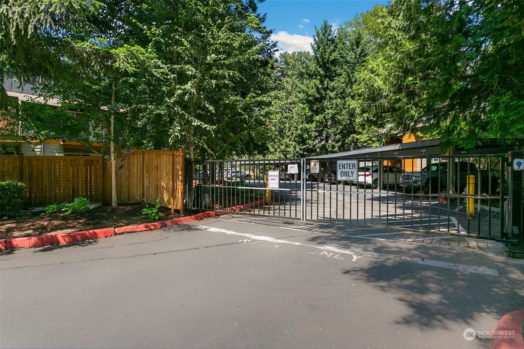 10822 Northeast 148th Lane, Unit J101 Bothell, WA 98011 - Photo 20 of 22 a balcony with street view