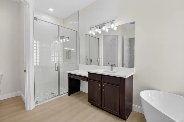 an aerial view of a house with a lake view