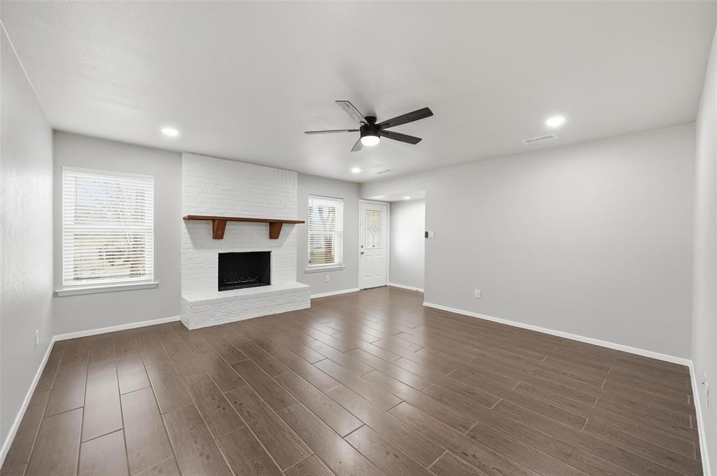 6200 Inspiration Point Arlington, TX 76016 - Photo 2 of 23 Wood-like tile throughout the home