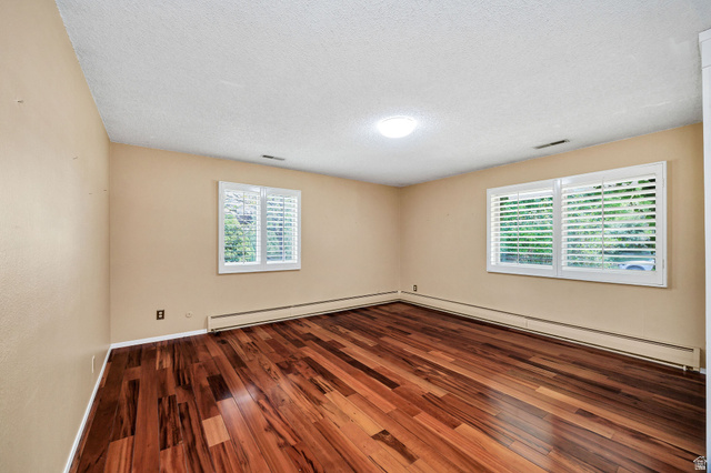 1365 Sumac Drive Logan, UT 84321 - Photo 25 of 66 Rich wood-finish flooring provides a striking contrast with the neutral wall tones