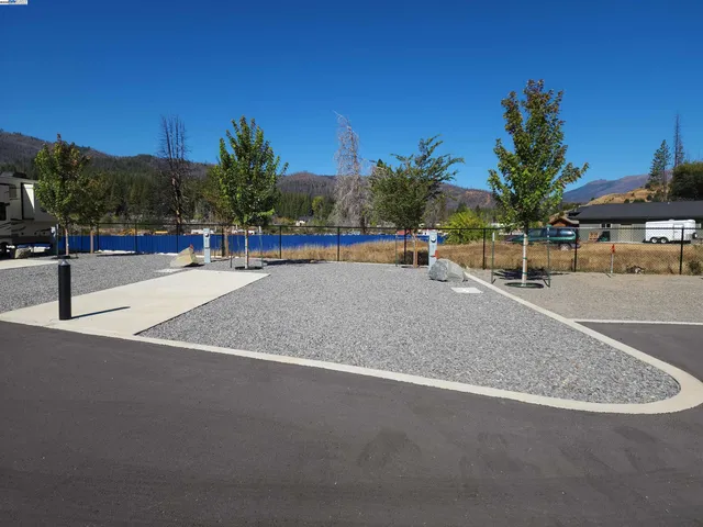 a bathroom with a black white checkered floor