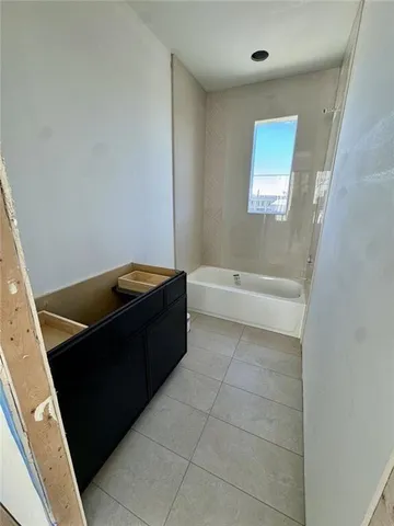 a view of kitchen island with stainless steel appliances kitchen island table and chairs