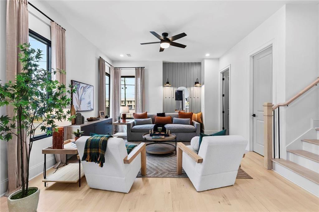 3960 Clairmont Road Chamblee, GA 30341 - Photo 24 of 63 a living room with furniture and a large window