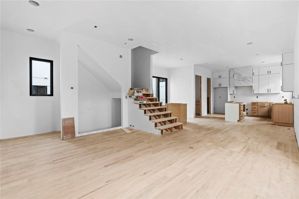 3960 Clairmont Road Chamblee, GA 30341 - Photo 48 of 63 a room with a bed and furniture