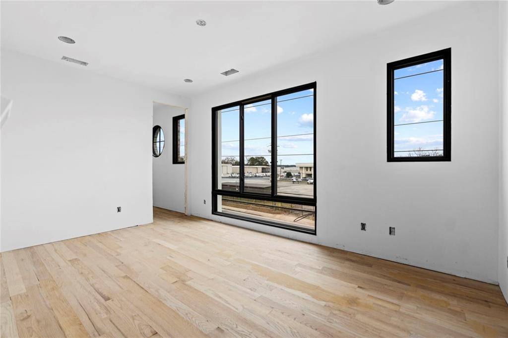 3960 Clairmont Road Chamblee, GA 30341 - Photo 55 of 63 a view of an empty room with glass door