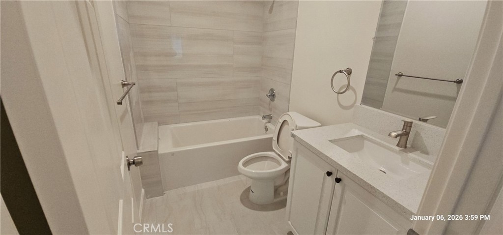 13485 Mesquite Road Whitewater, CA 92282 - Photo 5 of 8 a bathroom with a sink a toilet and shower