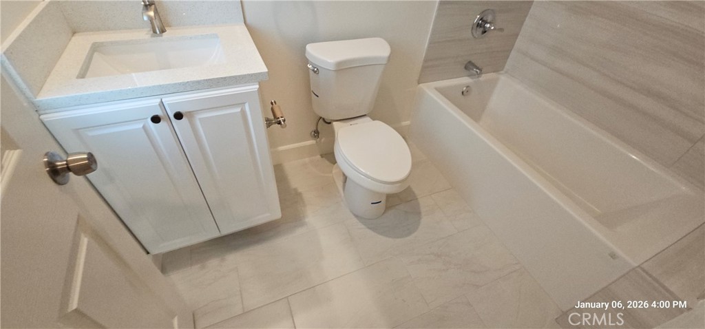 13485 Mesquite Road Whitewater, CA 92282 - Photo 6 of 8 a bathroom with a toilet and a shower