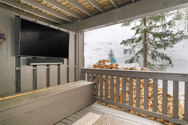 a view of a balcony with furniture