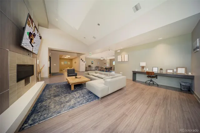 an outdoor space with furniture and umbrella