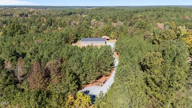 an aerial view of residential house with outdoor space