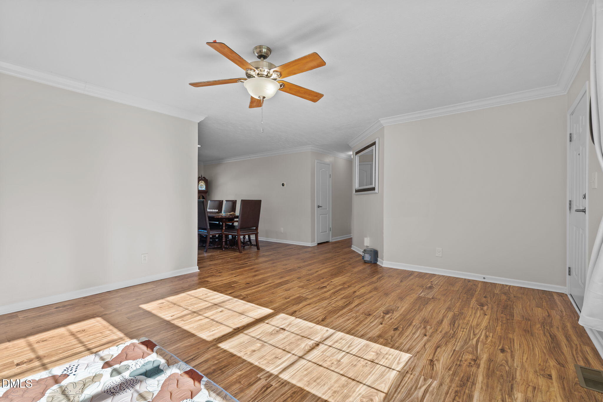 1940 Wadsworth Road Carthage, NC 28327 - Photo 14 of 57 a bed room with a bed and a chandelier