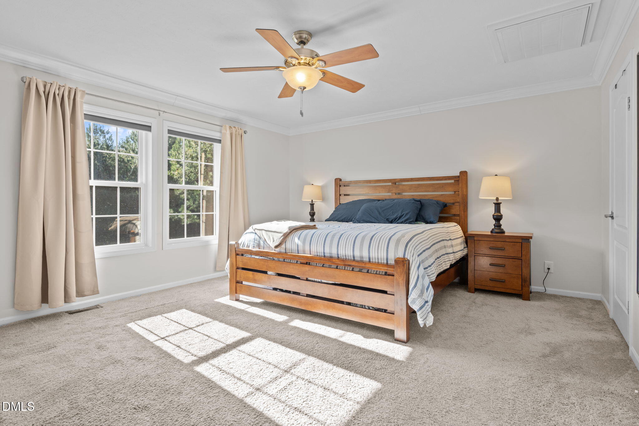 1940 Wadsworth Road Carthage, NC 28327 - Photo 23 of 57 a bedroom with a bed and a large window
