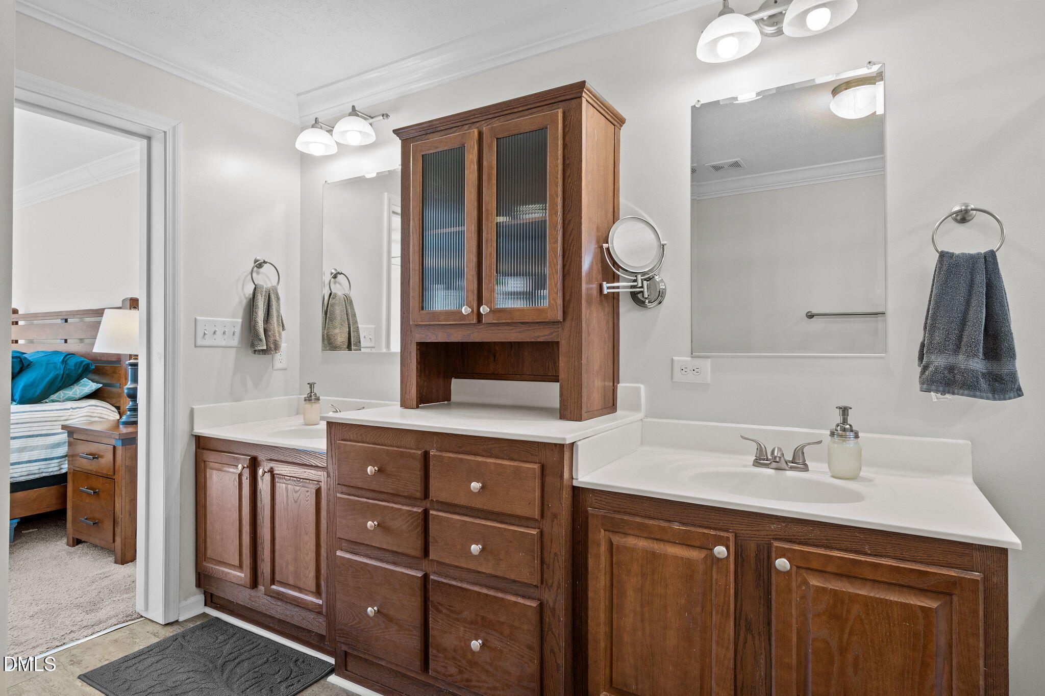 1940 Wadsworth Road Carthage, NC 28327 - Photo 26 of 57 a bathroom with a sink vanity and mirror