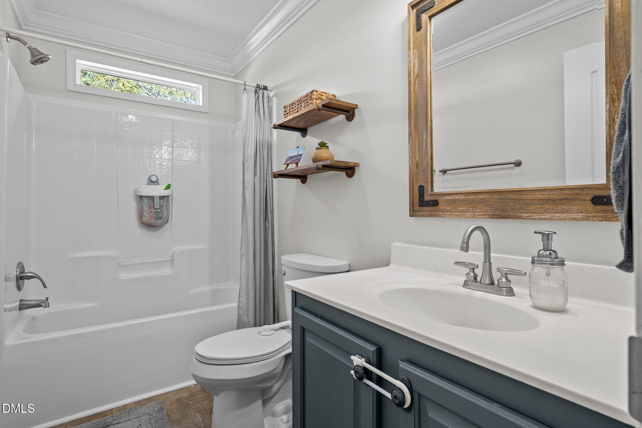 1940 Wadsworth Road Carthage, NC 28327 - Photo 32 of 57 a bathroom with a sink a toilet and shower