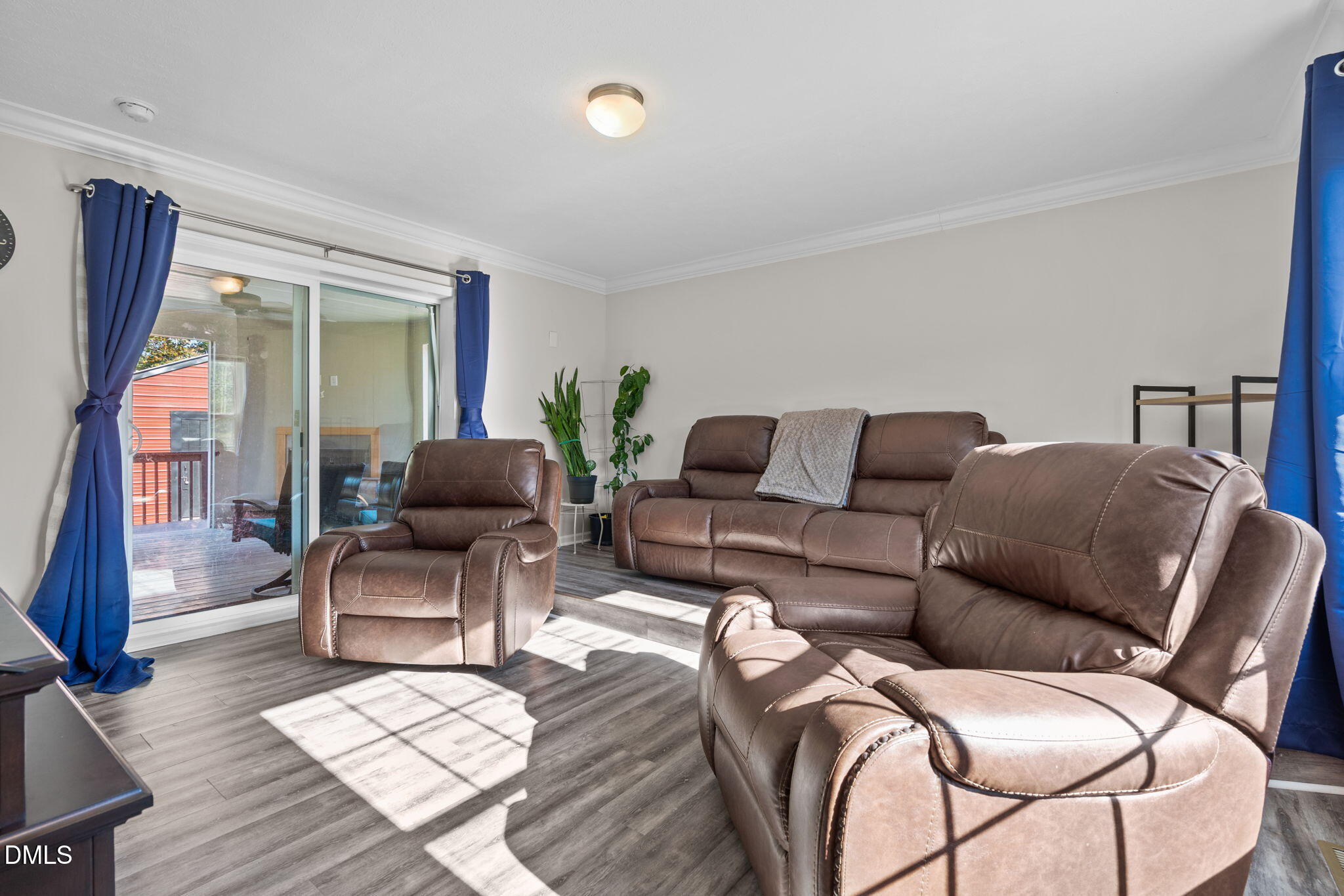 1940 Wadsworth Road Carthage, NC 28327 - Photo 35 of 57 a living room with furniture a wooden floor and next to a window