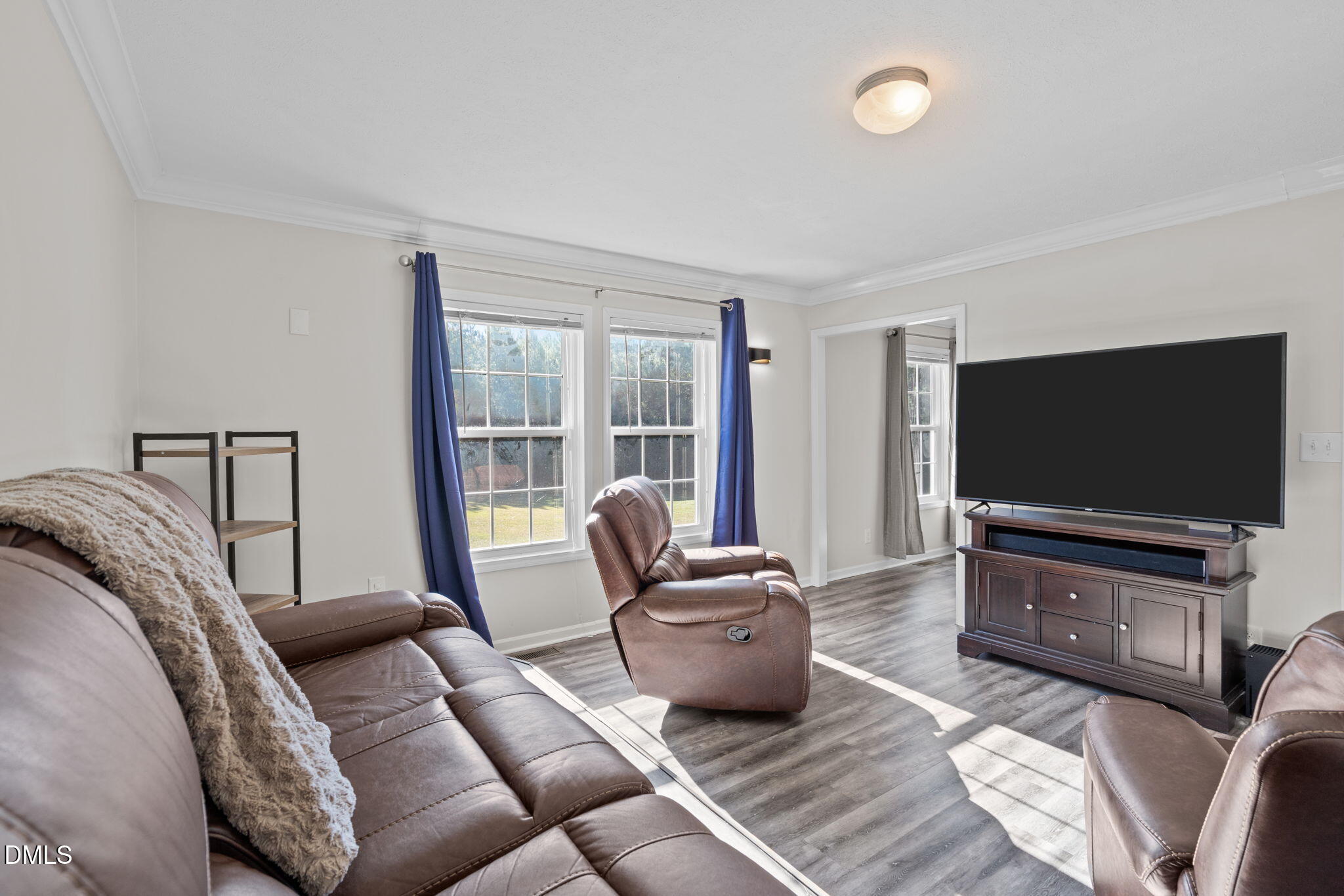 1940 Wadsworth Road Carthage, NC 28327 - Photo 37 of 57 a living room with furniture and a flat screen tv