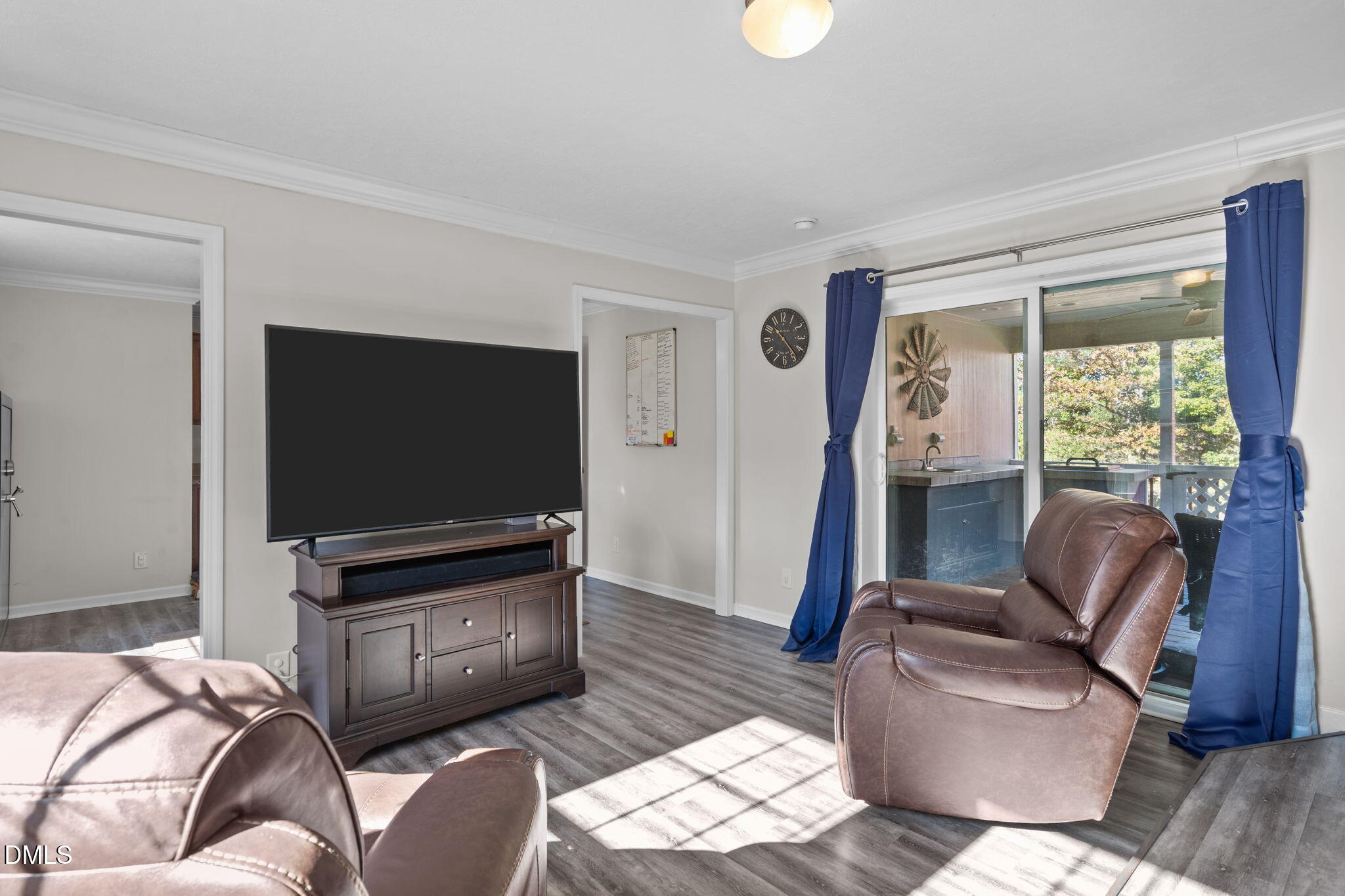 1940 Wadsworth Road Carthage, NC 28327 - Photo 38 of 57 a living room with furniture and a flat screen tv