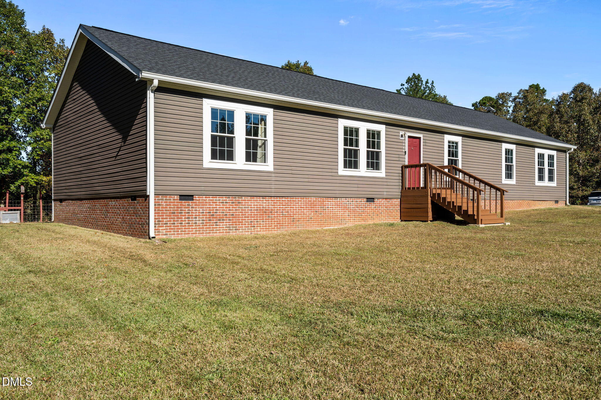 1940 Wadsworth Road Carthage, NC 28327 - Photo 5 of 57 a view of a house with a backyard