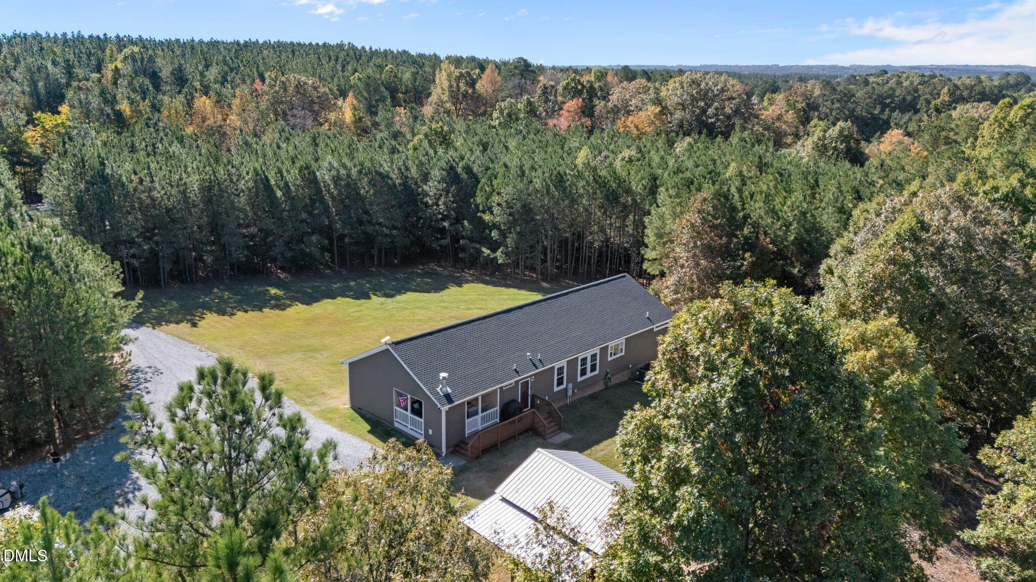 1940 Wadsworth Road Carthage, NC 28327 - Photo 52 of 57 an aerial view of a house with a yard