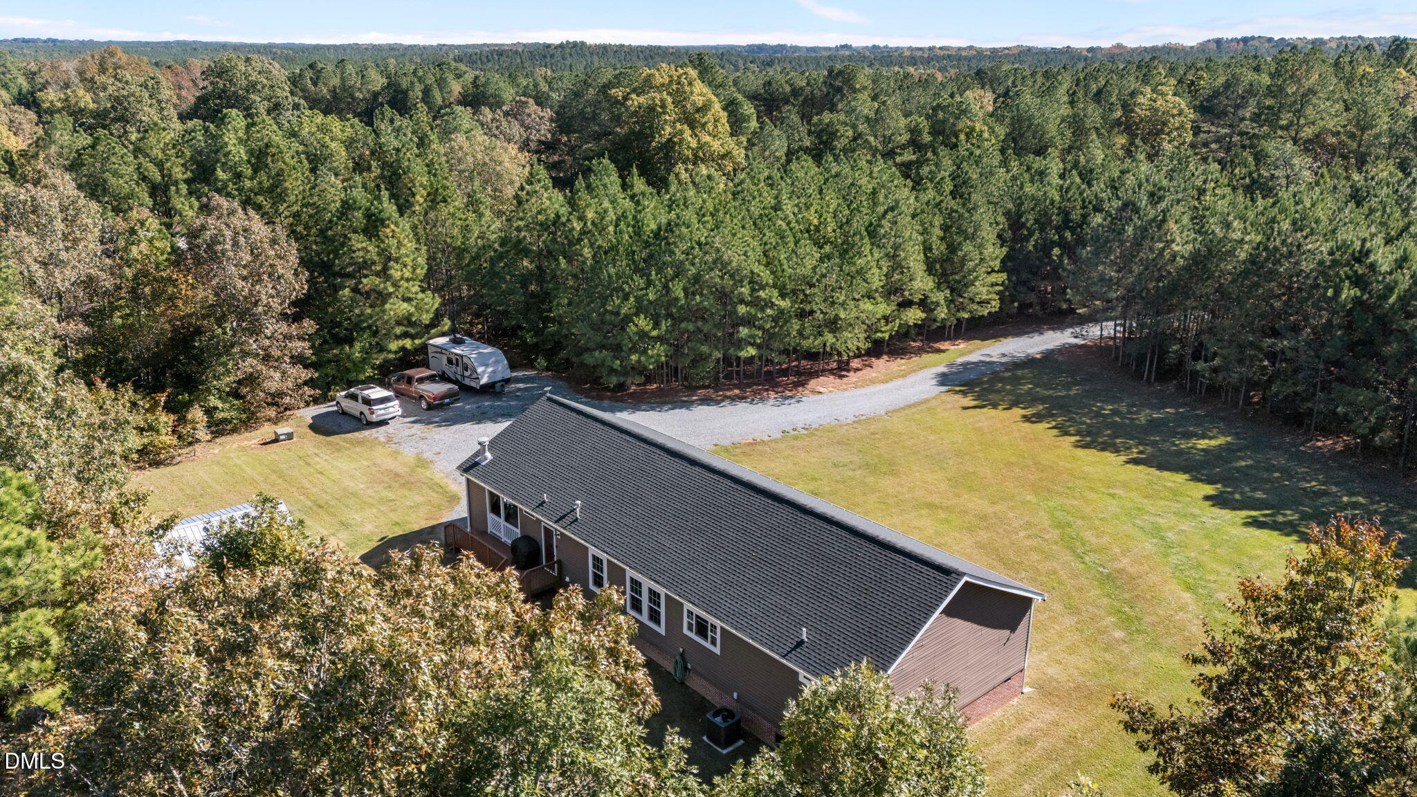 1940 Wadsworth Road Carthage, NC 28327 - Photo 54 of 57 an aerial view of a house with a yard