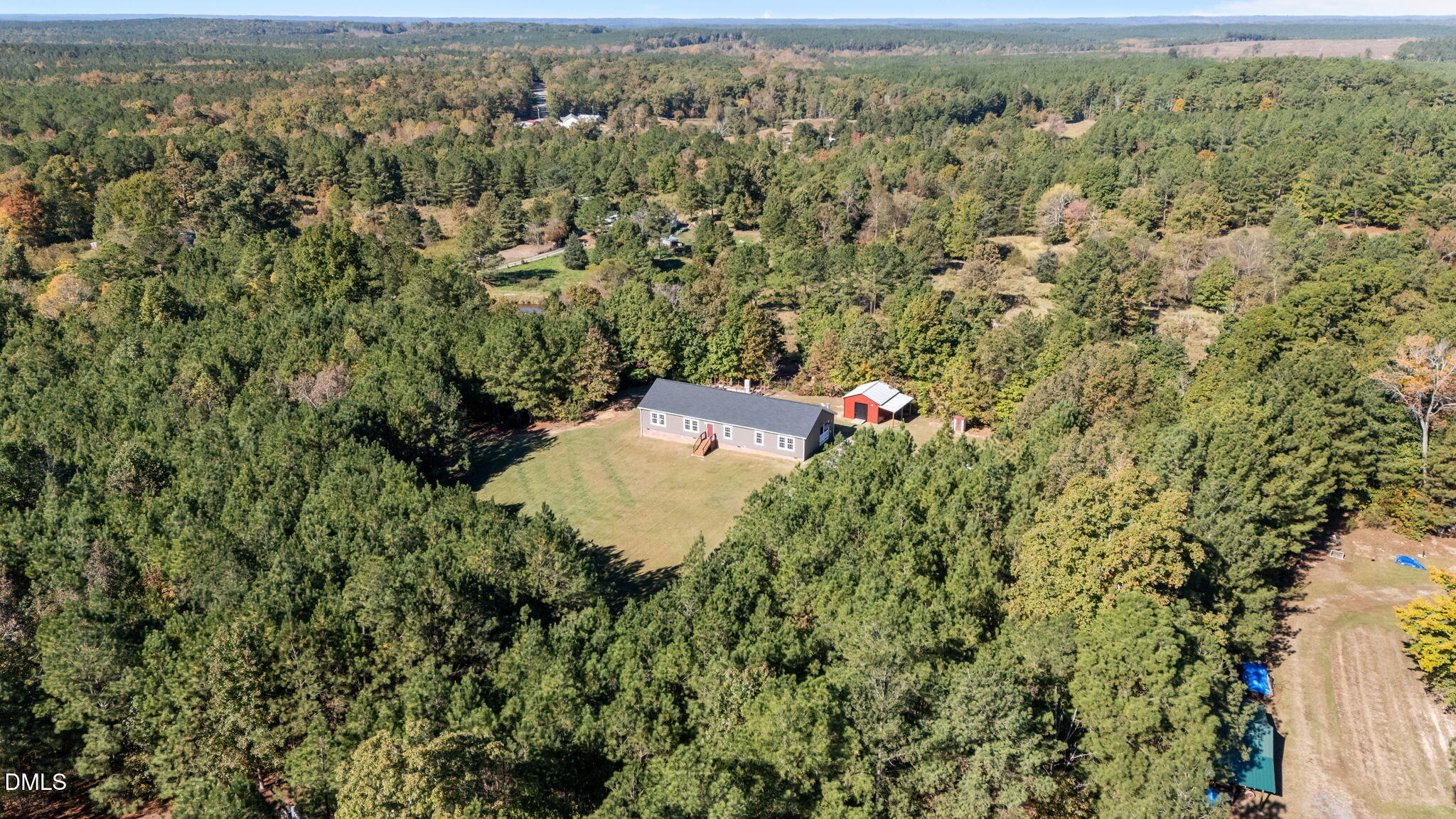 1940 Wadsworth Road Carthage, NC 28327 - Photo 55 of 57 an aerial view of a house with a yard