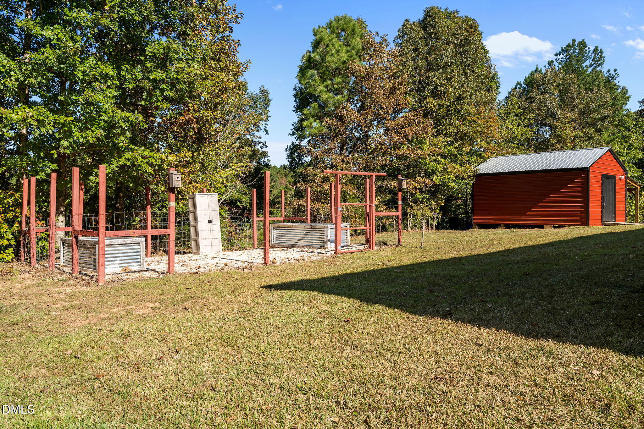 1940 Wadsworth Road Carthage, NC 28327 - Photo 9 of 57 a view of a house with a yard