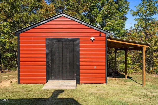 a view of a livingroom with furniture and wooden floor
