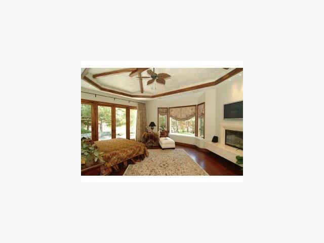12441 Parker Ranch Road Saratoga, CA 95070 - Photo 7 of 9 a picture of a living room with a table and chairs
