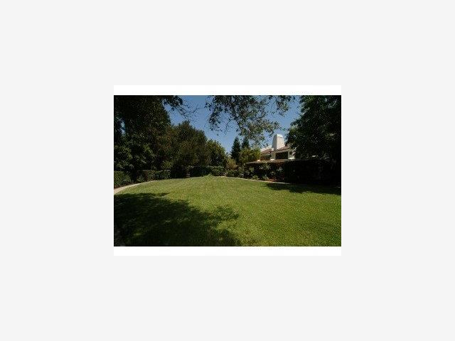 12441 Parker Ranch Road Saratoga, CA 95070 - Photo 8 of 9 a picture of a bench in a field