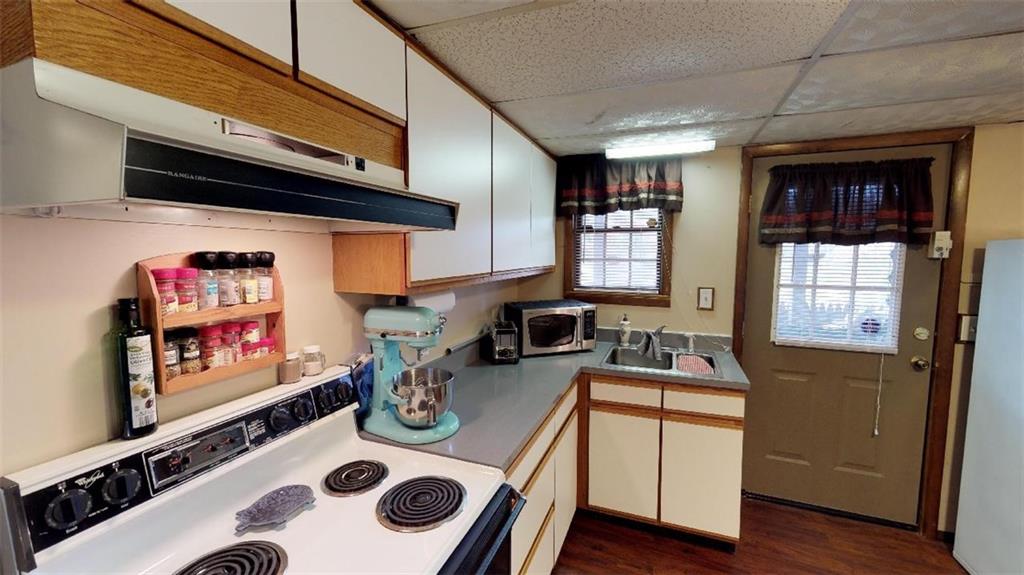 104 England Street Butler, PA 16001 - Photo 16 of 21 Lower Level apartment kitchen! Door leads to cover patio!