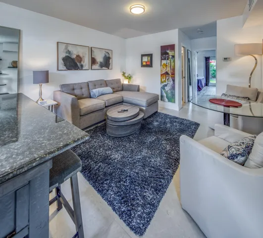 a living room with furniture and a couch